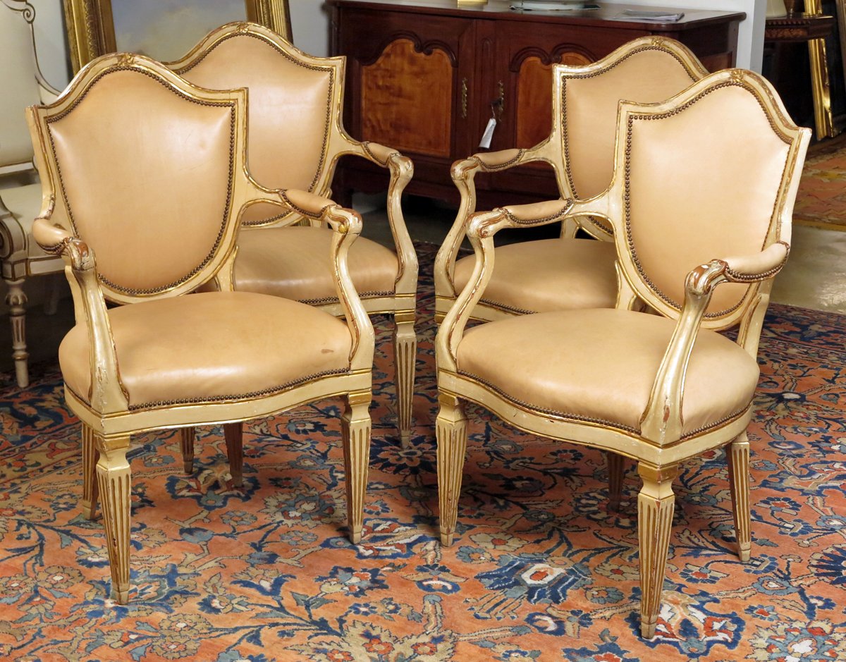 A Set of Four North Italian Neoclassic Cream Painted & Parcel Gilt Armchairs