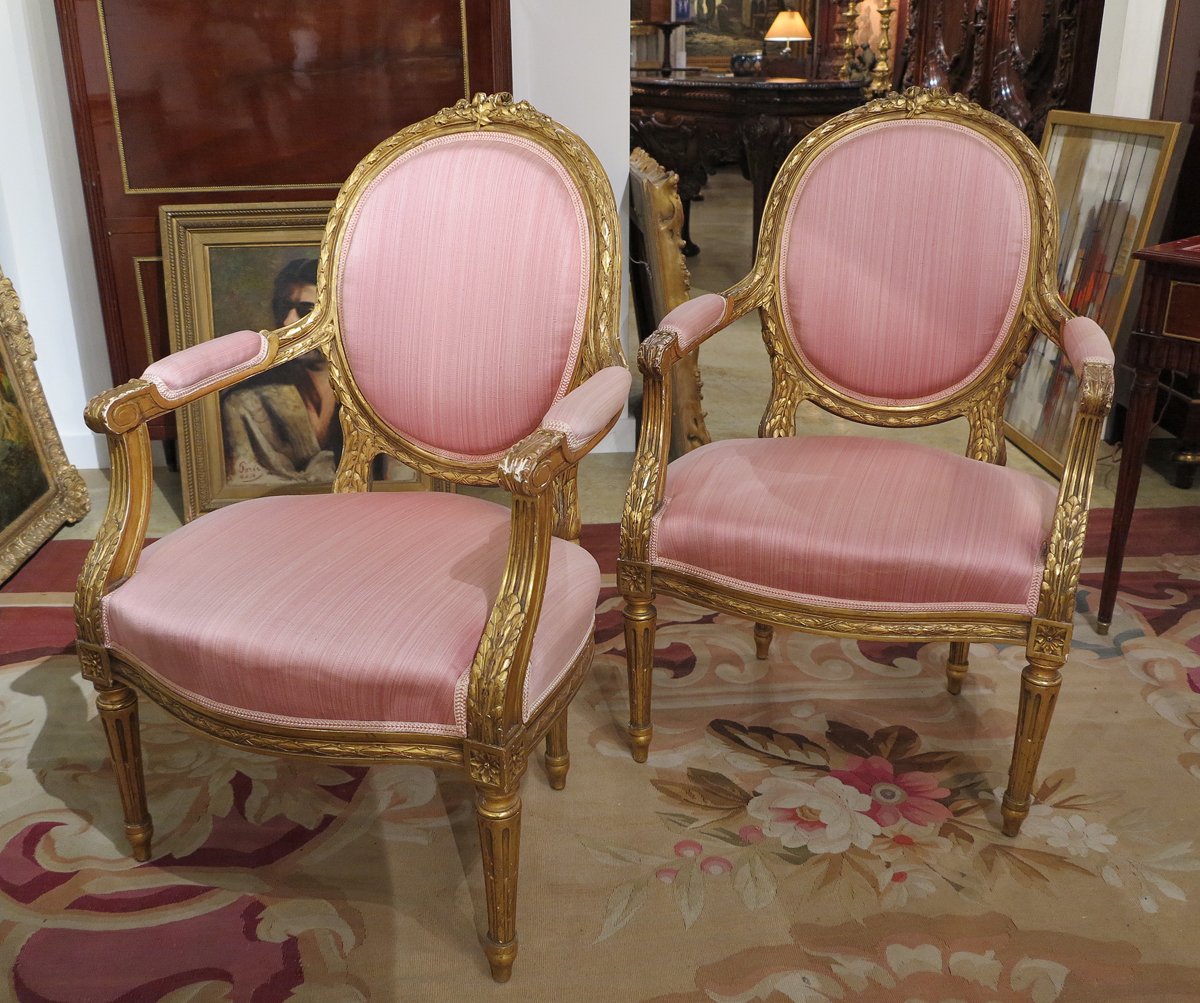 A Pair of Louis XVI Style Giltwood Armchairs